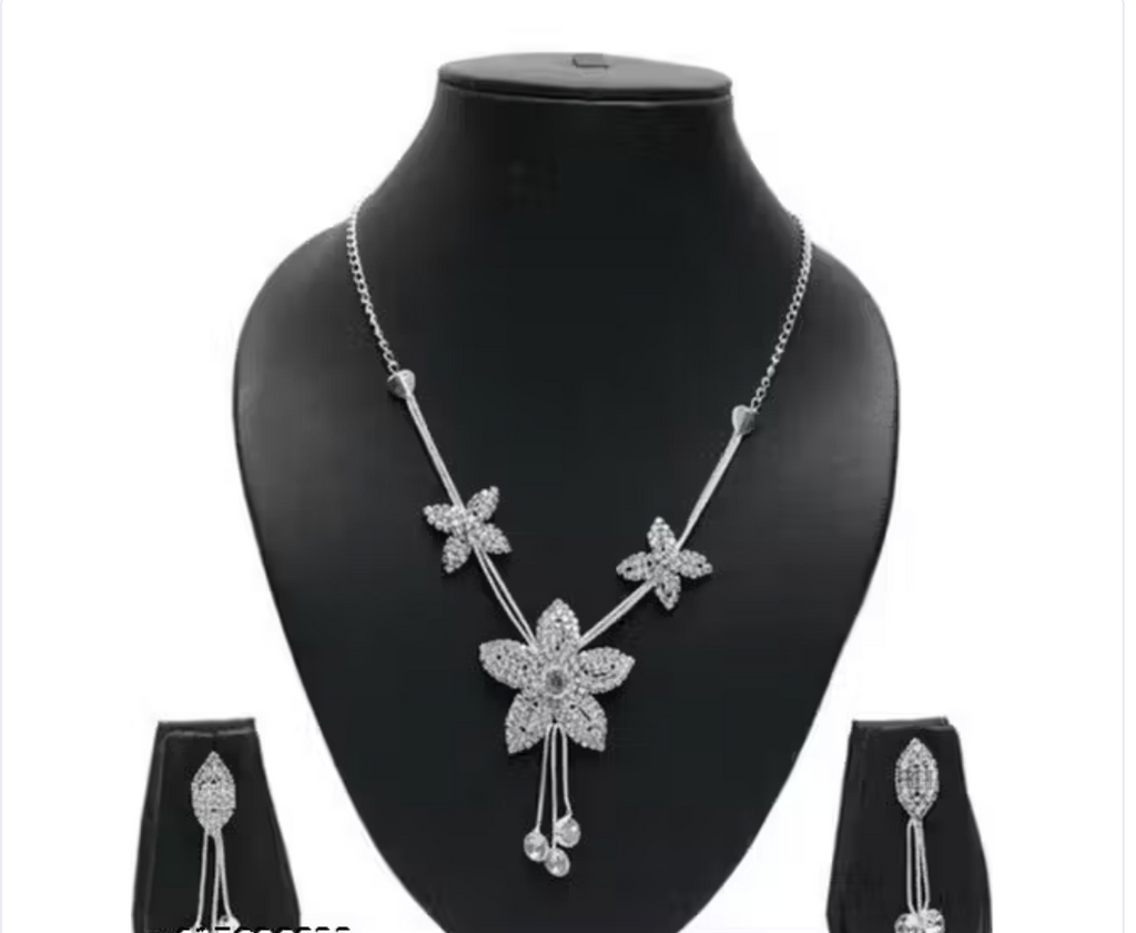 The Eternal Blossom Silver Crystal Floral Star Shape Necklace and Drop Earring Set