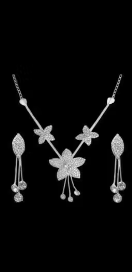 The Eternal Blossom Silver Crystal Floral Star Shape Necklace and Drop Earring Set